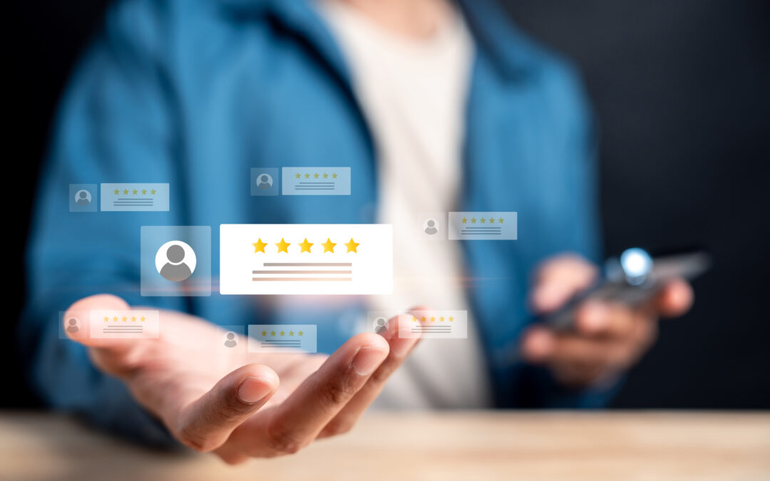 A concept image of a customer holding out their hand below several 5-star reviews for a small business.